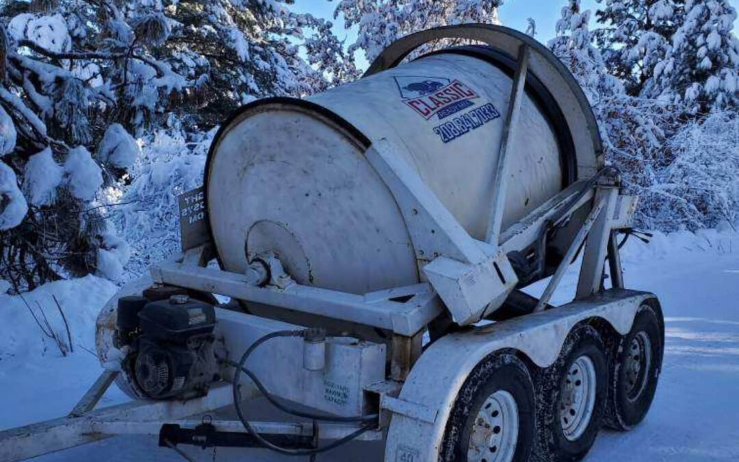 Barrel U-Cart Concrete Mixing Trailer Snowy Background